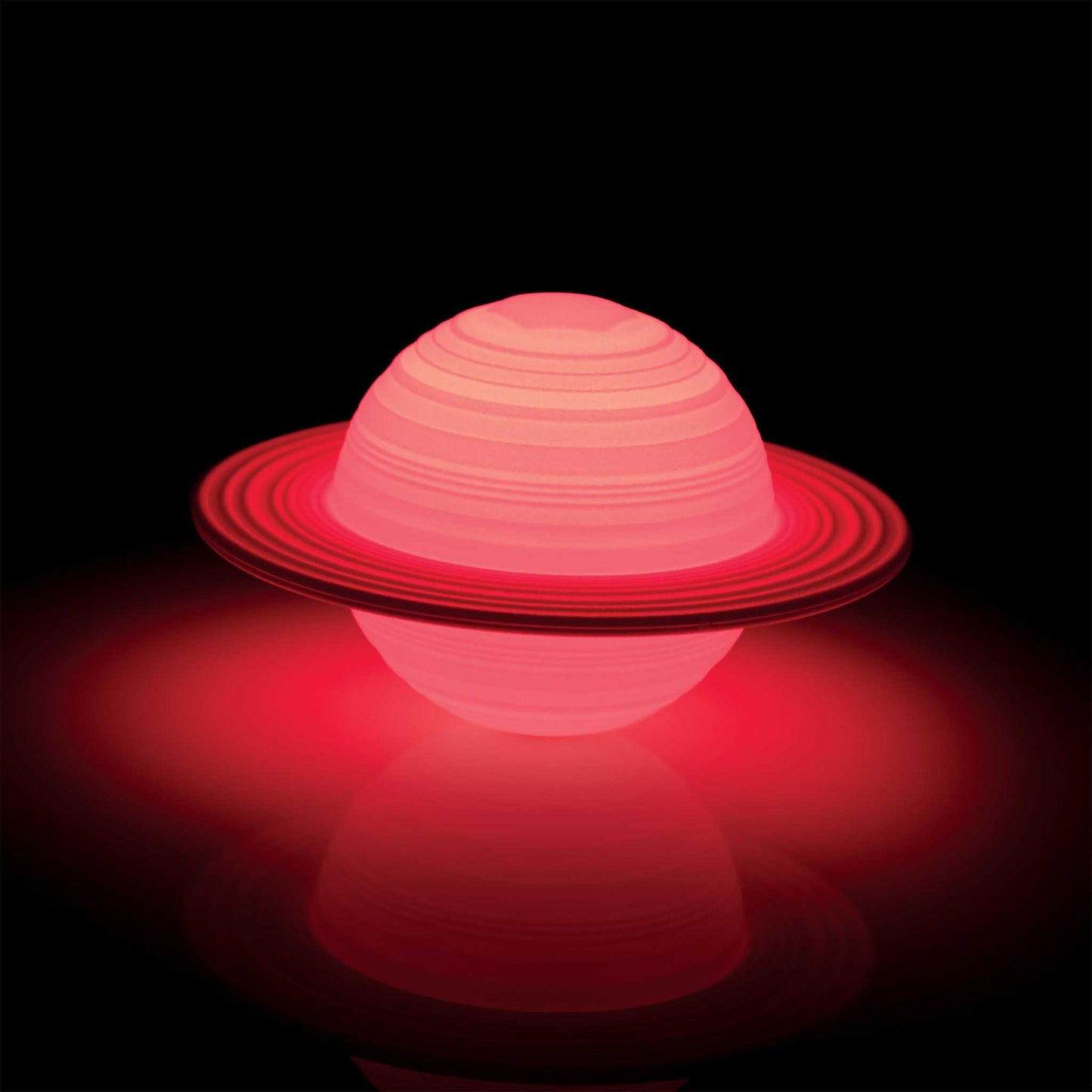 Red spherical object with concentric rings on a black background