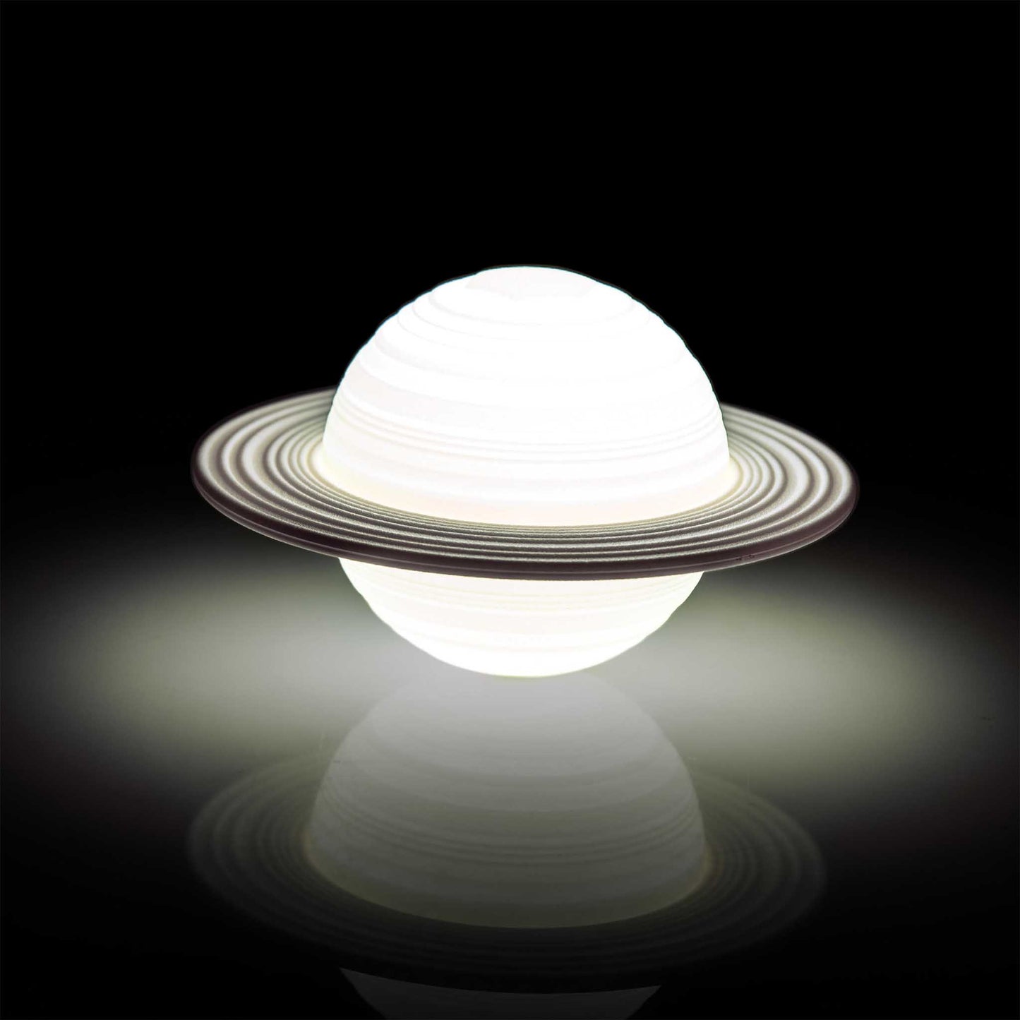 Lighting fixture shaped like Saturn on a black background