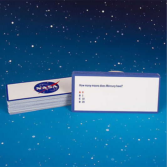 Stack of NASA-themed flashcards on a starry space background