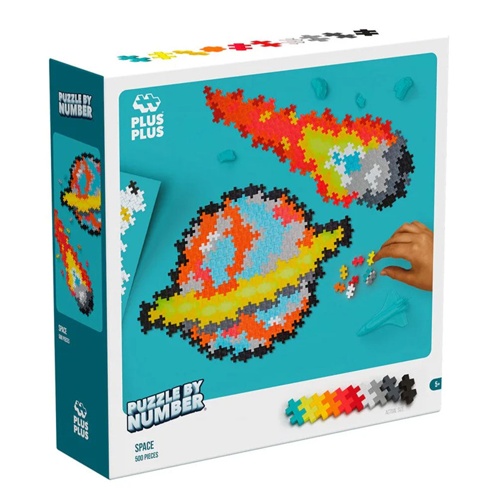 Plus Plus space-themed puzzle packaging with colorful pieces and a hand interacting with them.