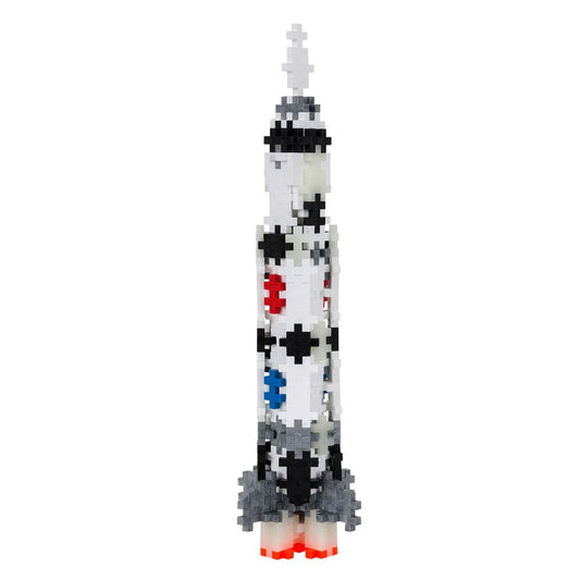 Model of a rocket made from interlocking bricks on a white background