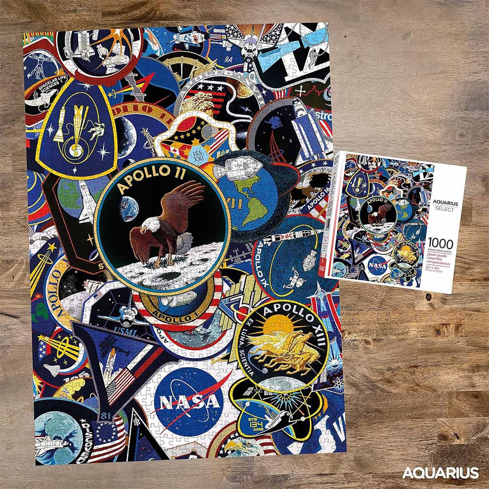 Collage of NASA and Apollo space mission patches on a wooden surface with a 'Aquarius' brand label.