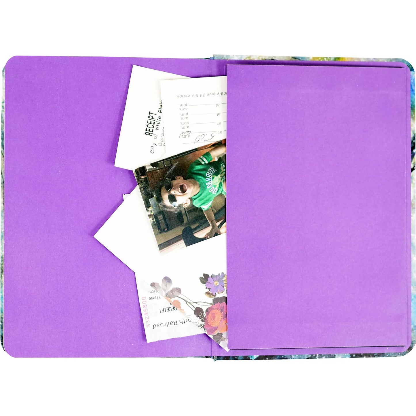 Purple folder with documents and photos inside on a white background