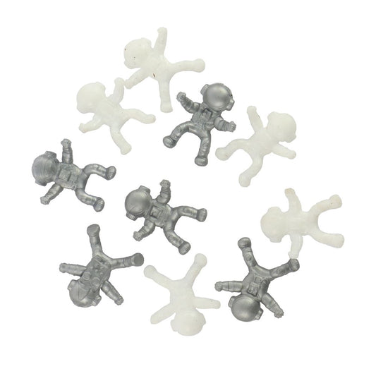 Small astronaut figurines in gray and white on a white background