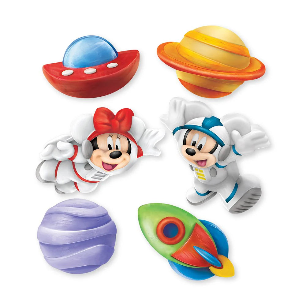 Toy figures of a spaceship, planet, and characters in space suits on a white background