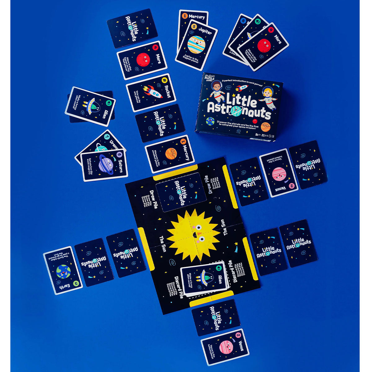 Card game set with 'Little Astronauts' branding on a blue background
