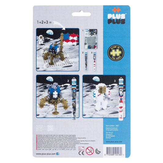 Plus Plus building block set packaging with astronaut figures and space-themed design.