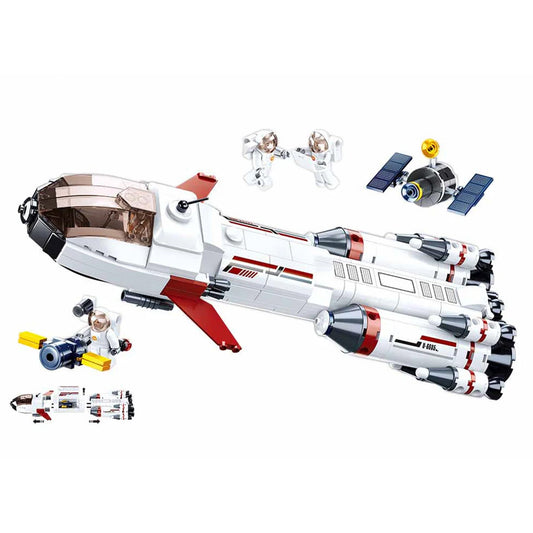 Toy space ship model with various accessories on a white background