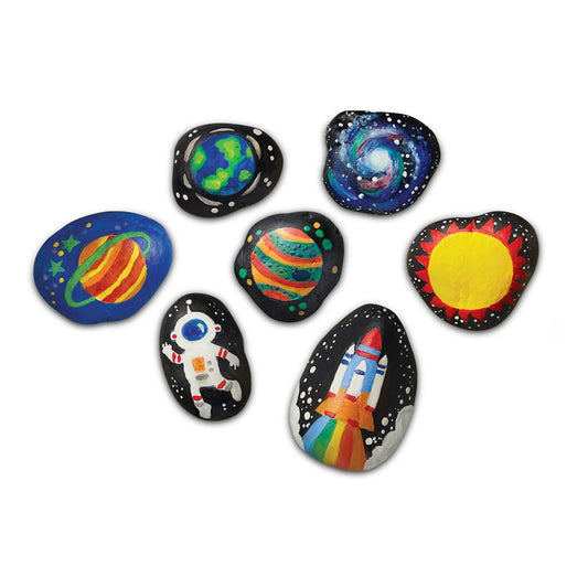 Set of painted rocks with space-themed designs on a white background