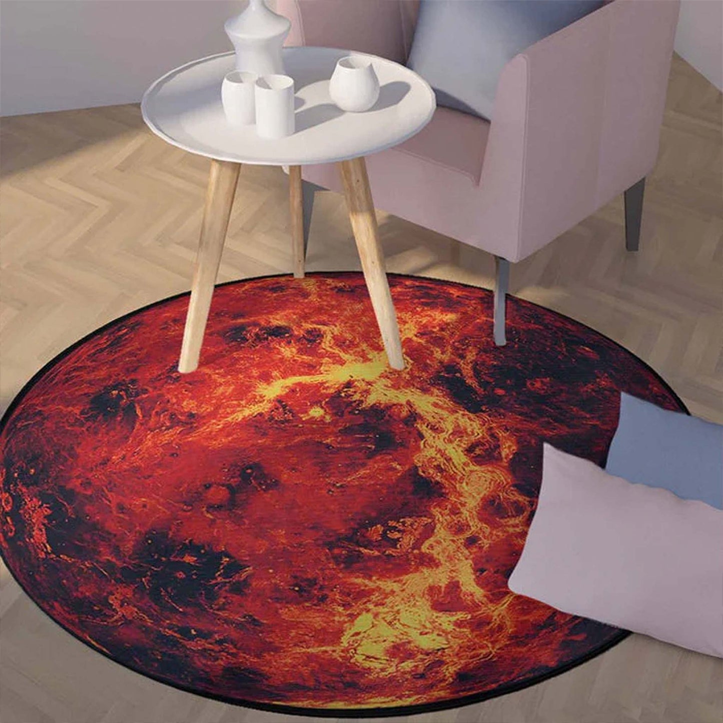 Round rug with fiery design in a room with a small table and chairs.