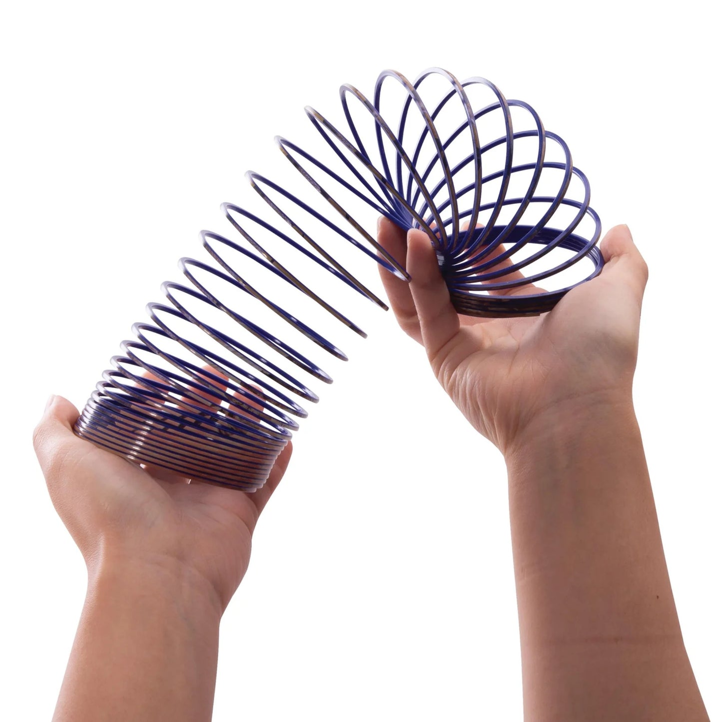 Purple slinky toy being held by two hands on a white background