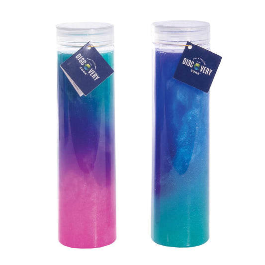 Two gradient-colored bottles with visible tags on a white background