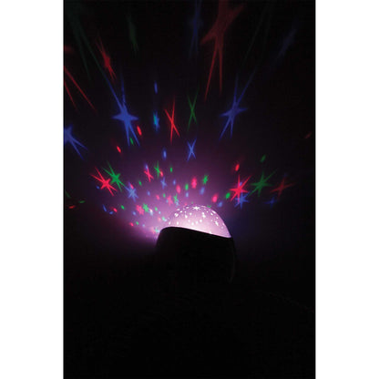 Colorful star-shaped light projector in a dark setting