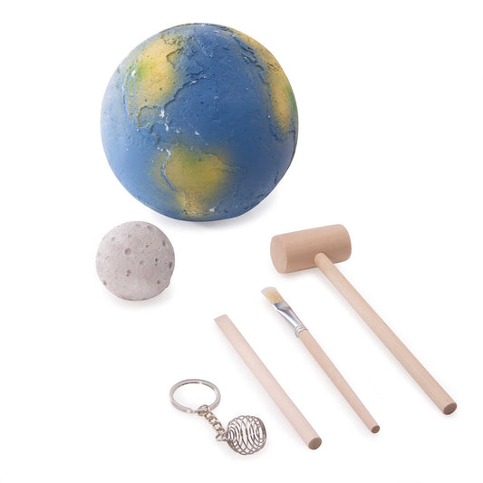 Set of items including a globe, small sphere, mallet, paintbrush, straws, and keychain on a white background