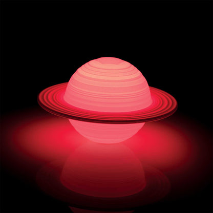 Red spherical object with concentric rings on a black background