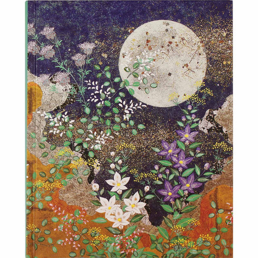 Decorative notebook cover with floral design and moon on a dark background