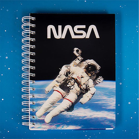 Notebook with NASA logo and astronaut image on a blue background