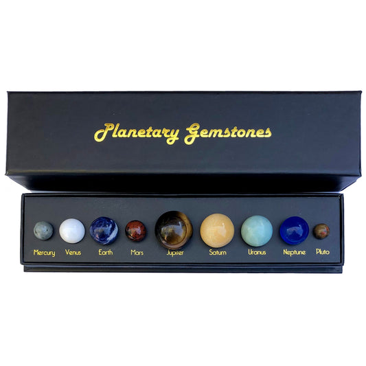 Box of Planetary Gemstones with labeled stones on a white background