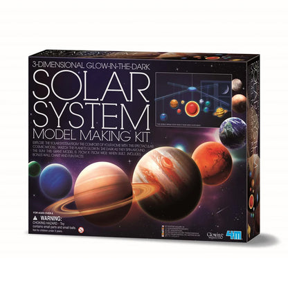 Solar system model making kit packaging with glowing planets on a dark background