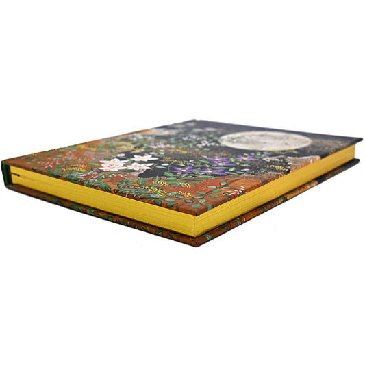 Decorative book with floral design on a white background