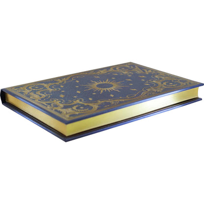 Decorative blue book with gold embossed design on a white background