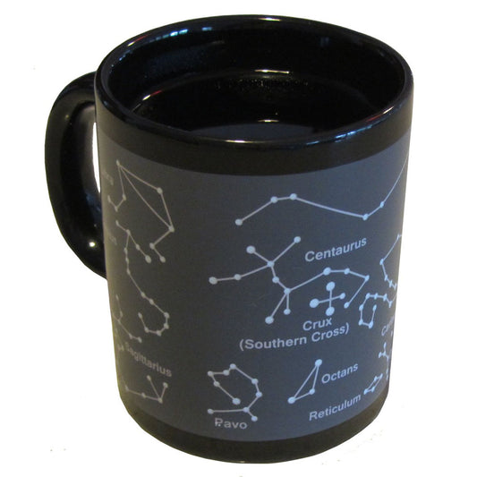 Black mug with constellation design on a white background