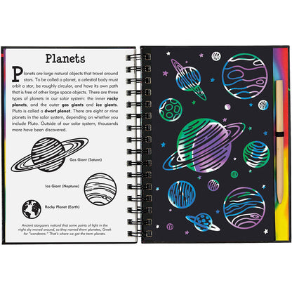 Open notebook with space-themed pages including illustrations of planets and text about planets.