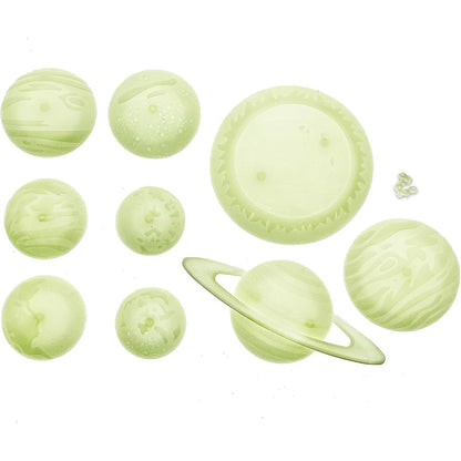 Set of green planet models on a white background