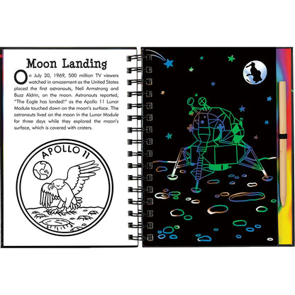 Spiral-bound book with moon landing illustration and text on a white background