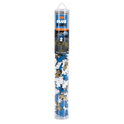 Tube of Plus-Plus building blocks with blue, white, and brown pieces on a white background