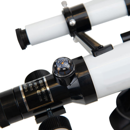 Close-up of a telescope with focus on the eyepiece and lens details.