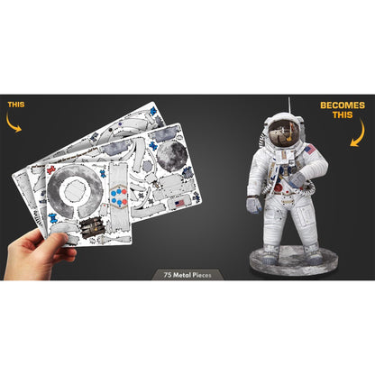 Card with astronaut design on one side and completed astronaut figure on the other, held by a hand.