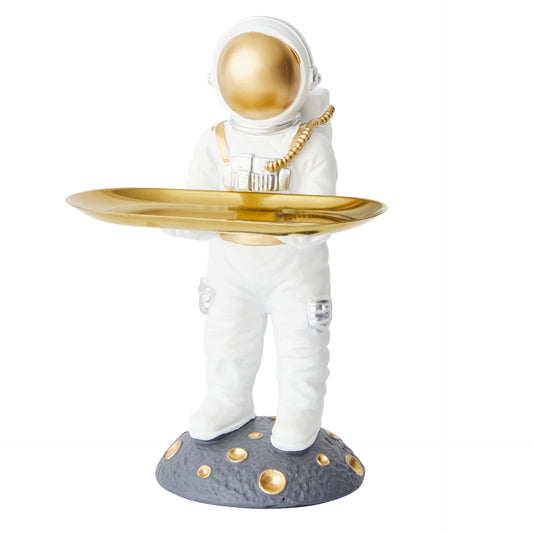 Astronaut figurine with a gold tray on a white background