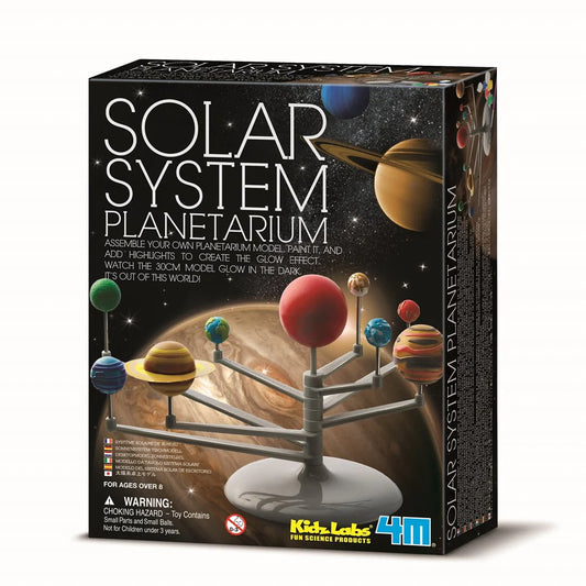 Box of a solar system planetarium model with colorful planets and stars on a black background.