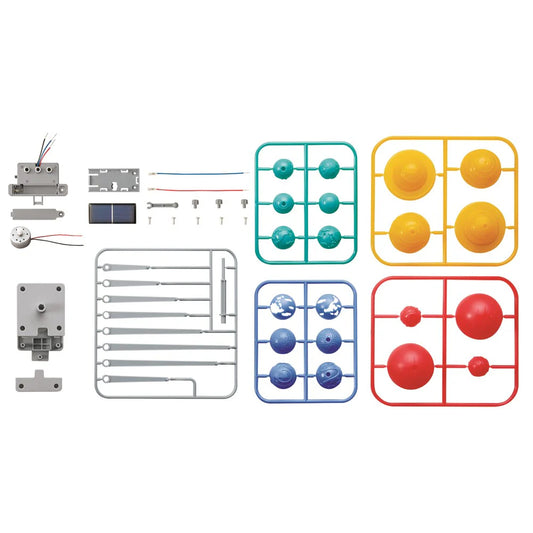 Set of electronic components and colored plastic parts on a white background