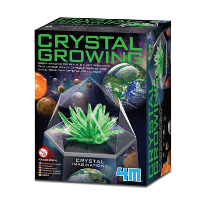 Box for a crystal growing kit with green crystals and space-themed design.