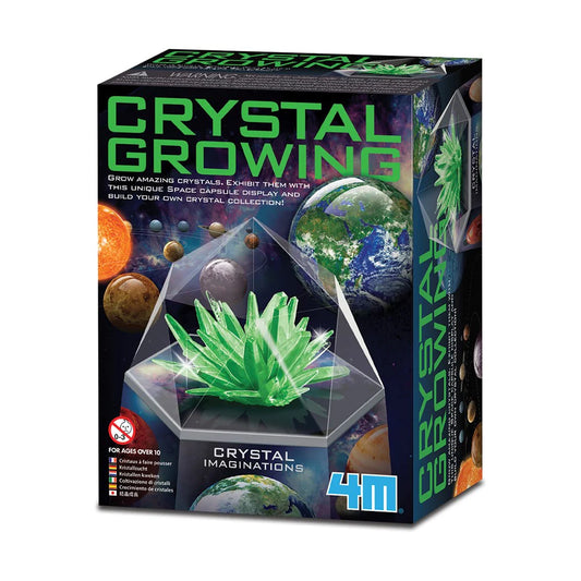 Box for a crystal growing kit with green crystals and space-themed design.