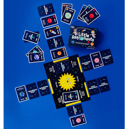 Card game set with 'Little Astronauts' branding on a blue background