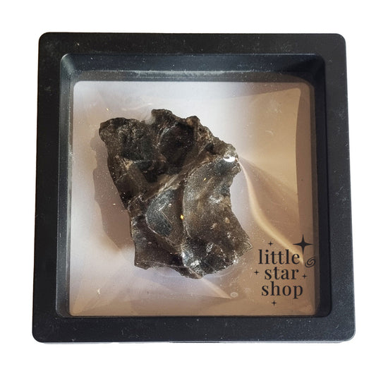 Mineral sample in a display case with 'little star shop' branding