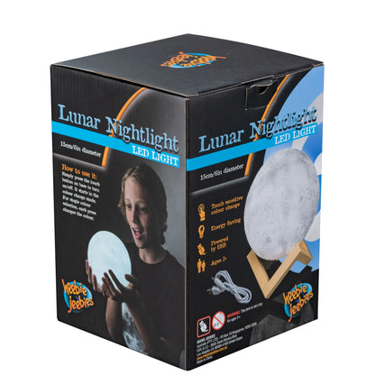 Box packaging of a Lunar Nightlight LED light with illustrations and text.