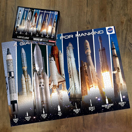 NASA rocket model set packaging on a wooden surface