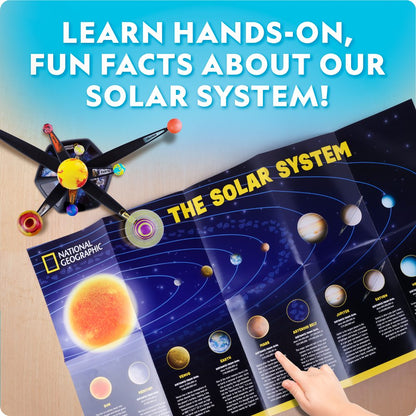 Educational solar system model with National Geographic branding and text about learning about the solar system.