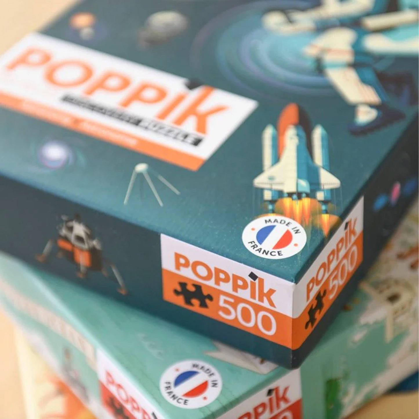 Poppik puzzle box with space-themed design and 'Made in France' label.