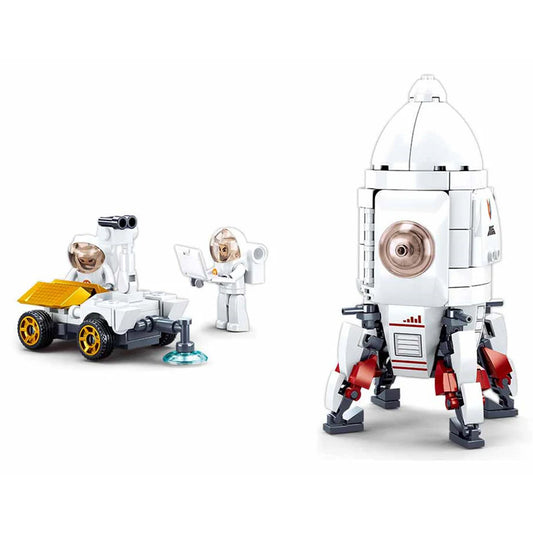 Toy rocket ship with astronauts and rover on a white background