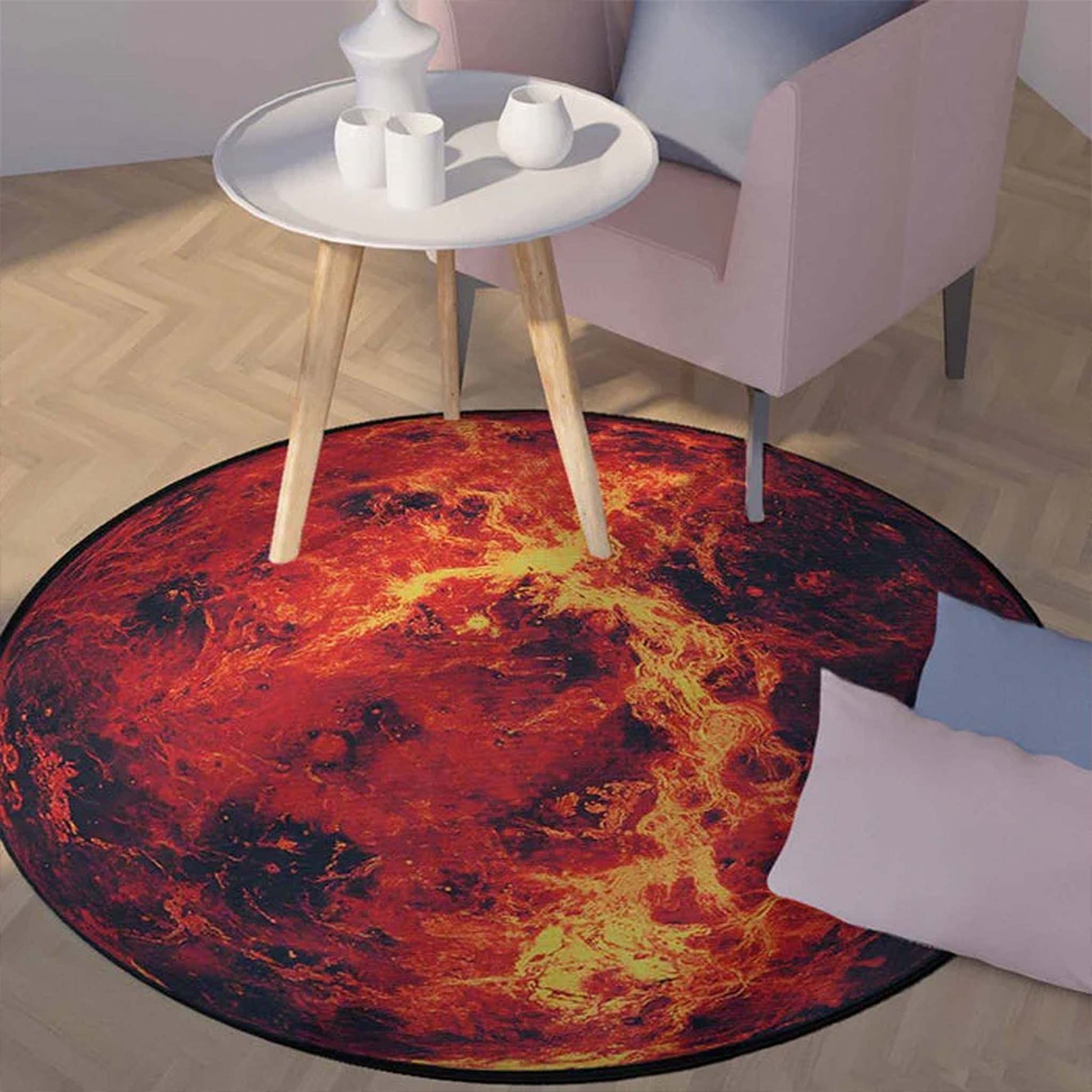 Round rug with fiery design in a room with a small table and chairs.