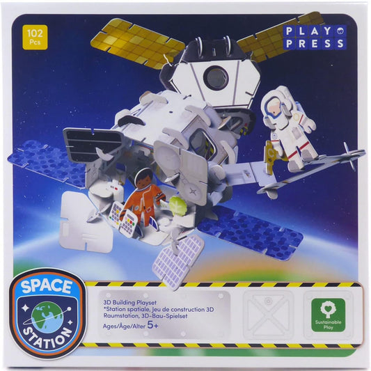 Toy space station set with astronauts on a blue background, featuring the brand 'Play Press'.