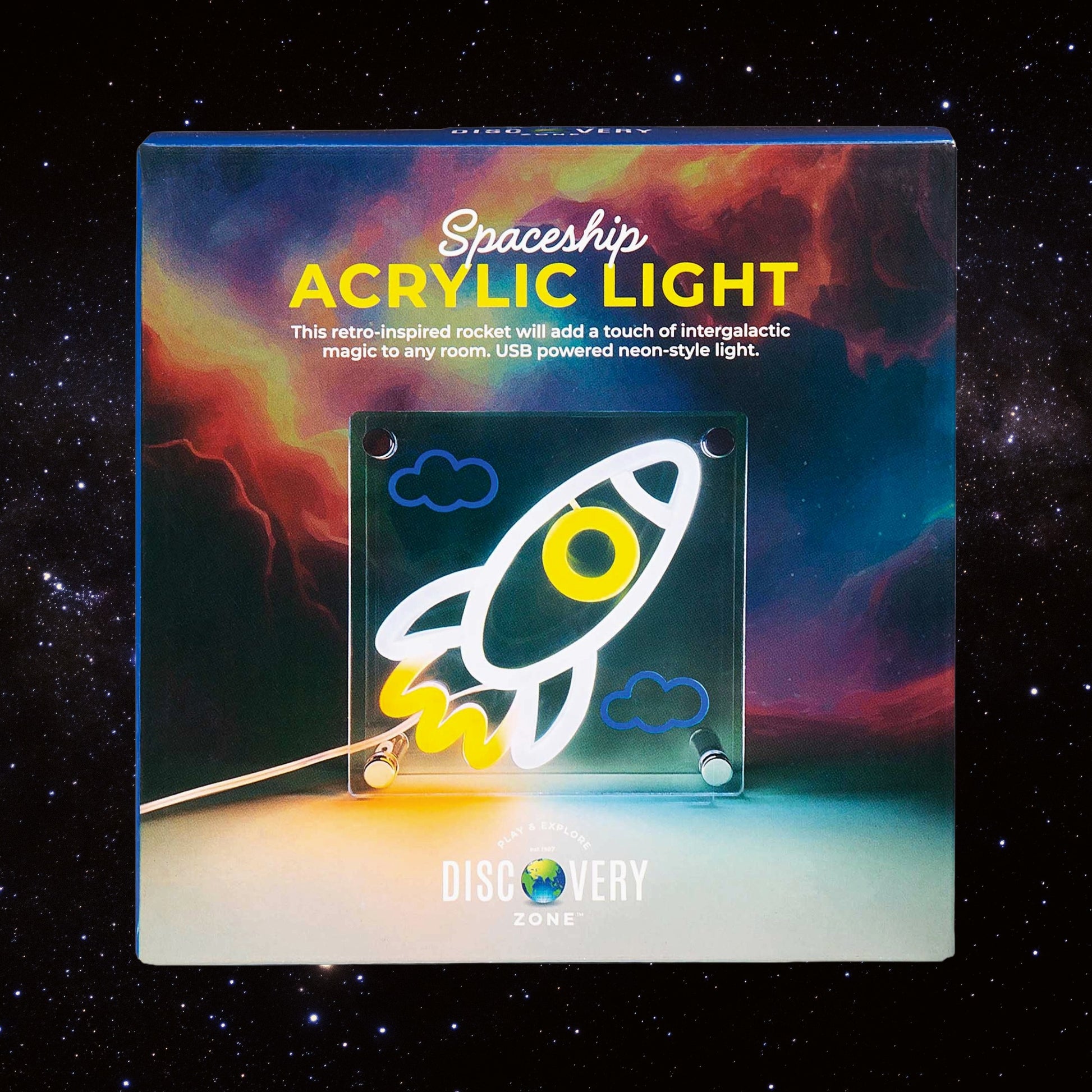 Spaceship acrylic light packaging with colorful design on a starry space background